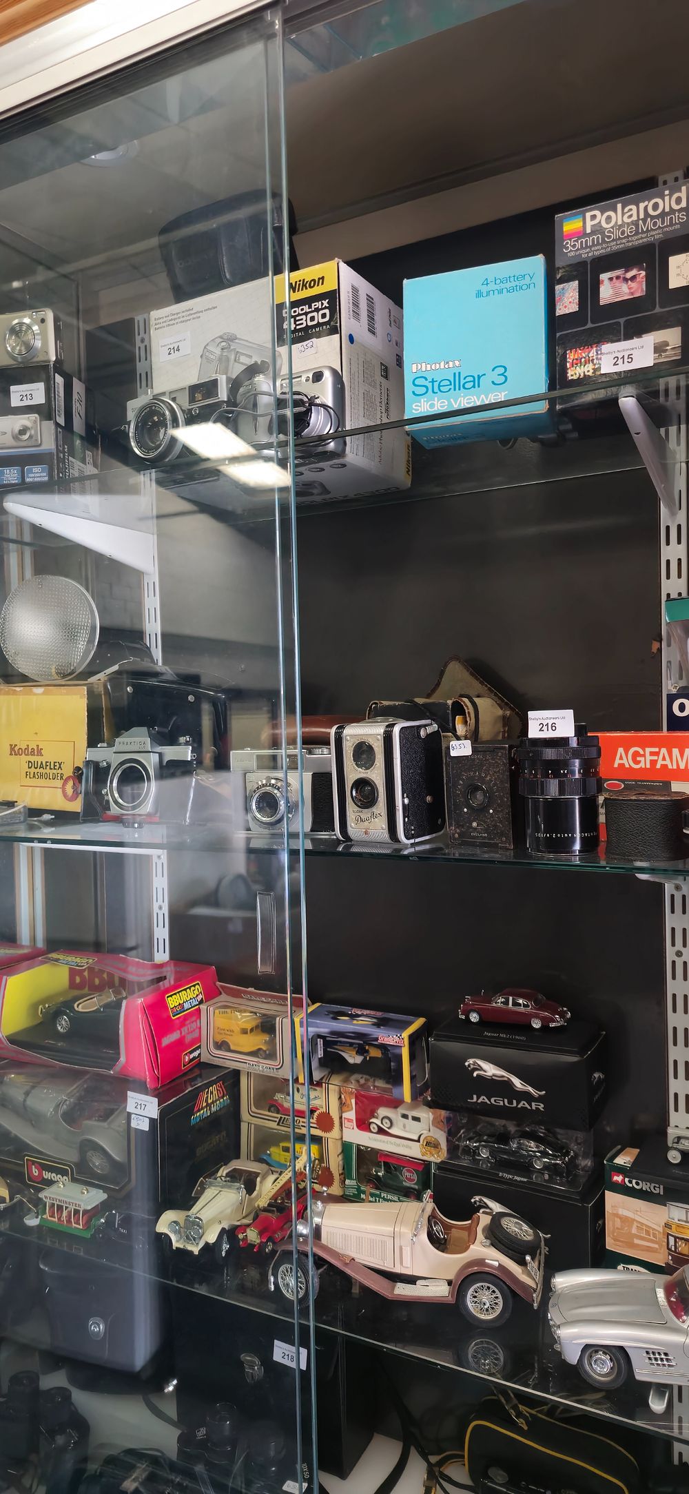 Lot 216: selection of various vintage cameras and lenses pratika kodak etc