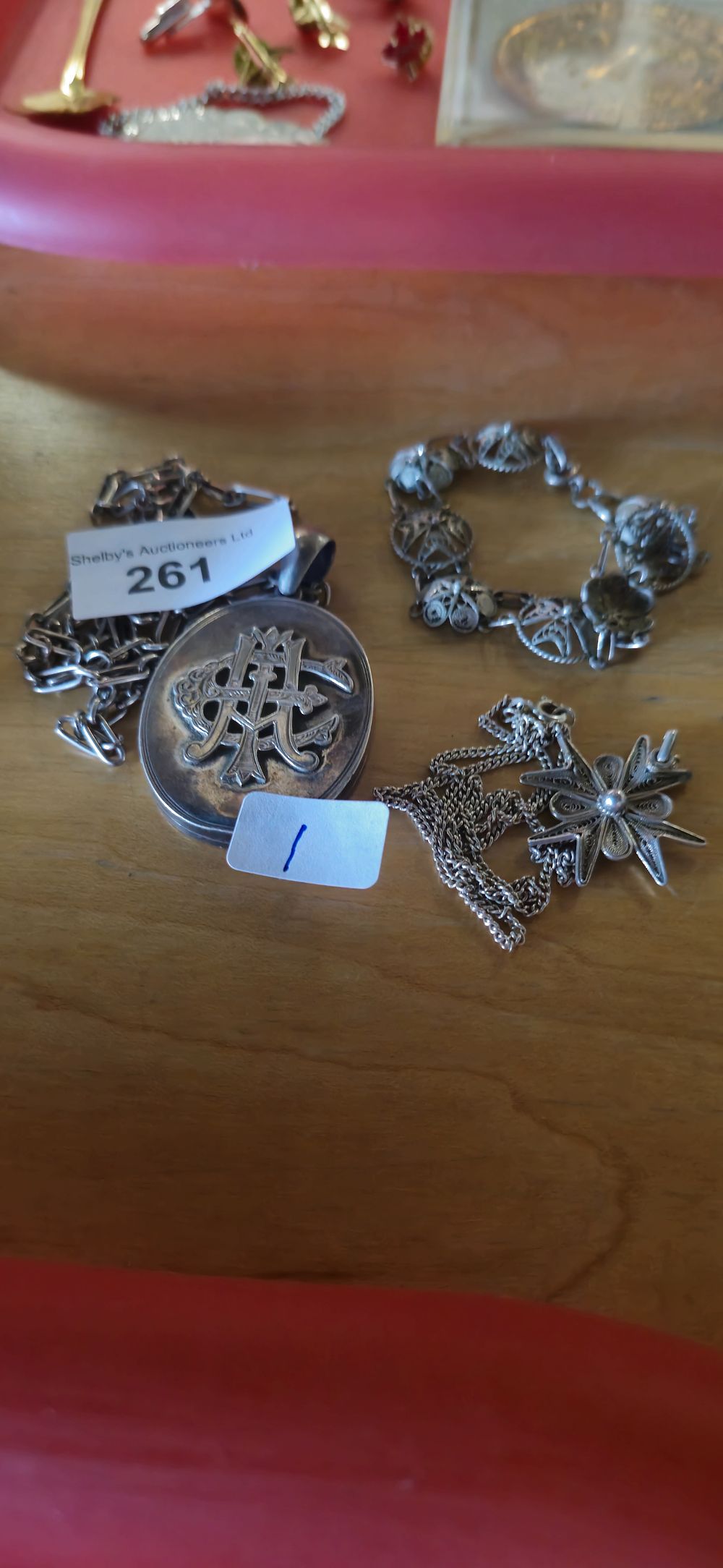 Lot 261: large silver locket with silver necklace with silver bracelet and silver necklace and pendant
