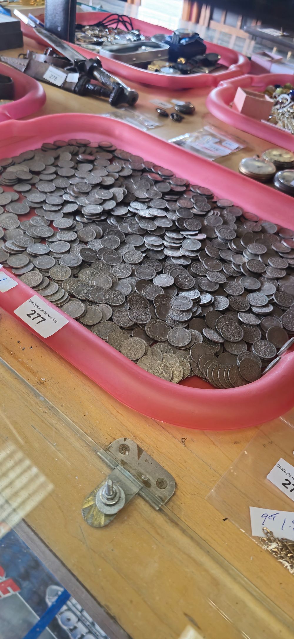Lot 277: 1 x tray containing 6 pence coins