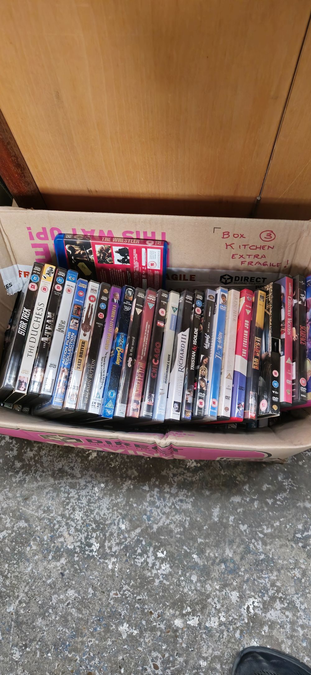 Lot 185: box containing various dvds different genres