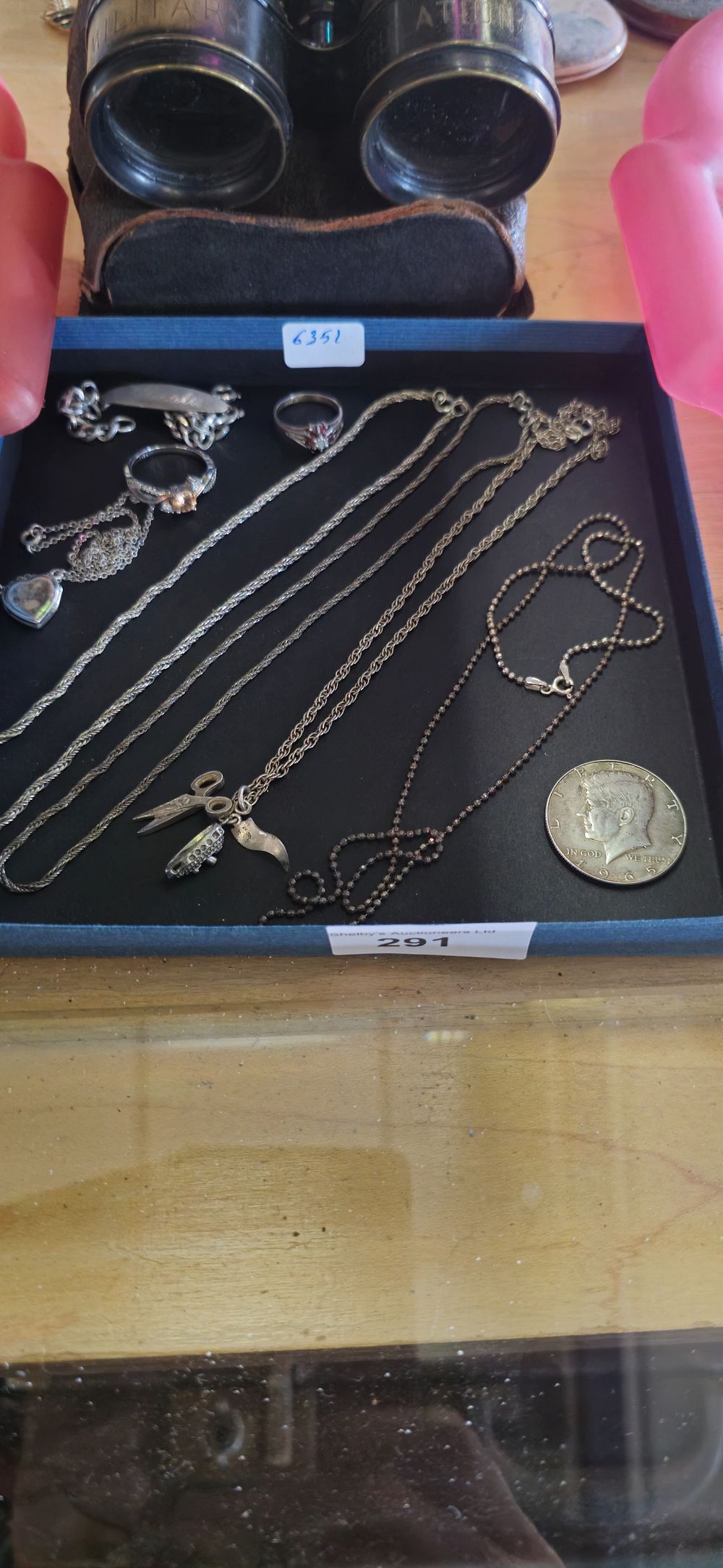 Lot 155: silver necklaces with rings and silver bracelet with american coin