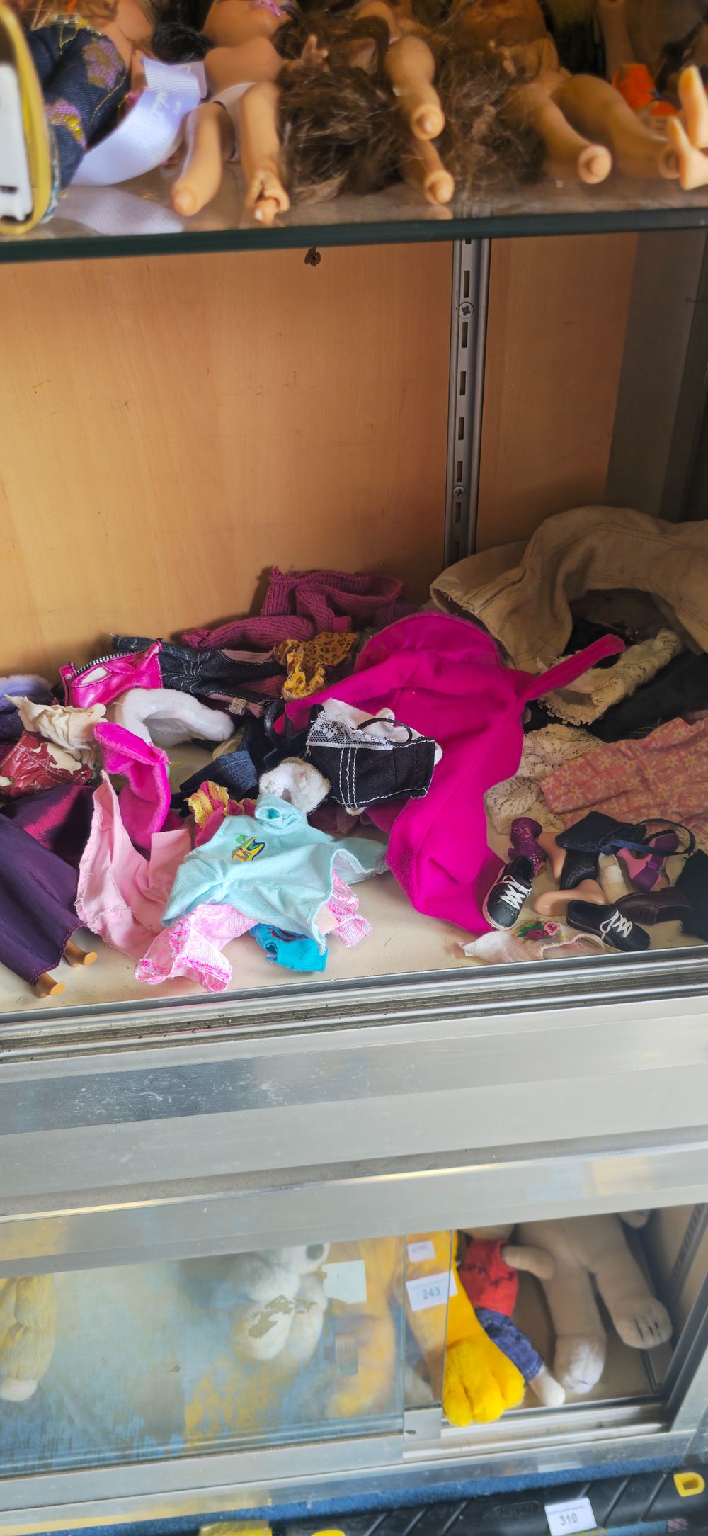 Lot 179: selection of barbie dolls with clothes