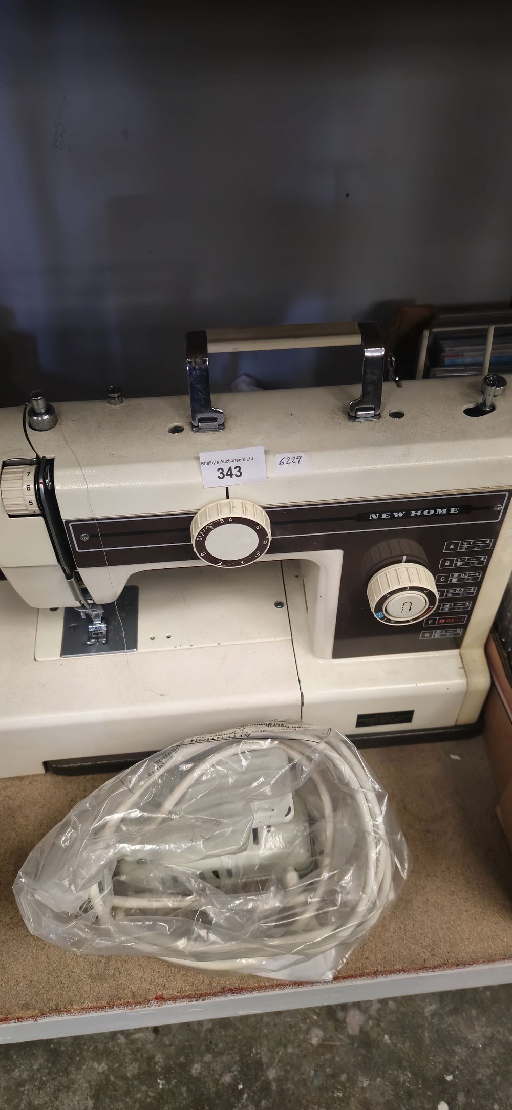 Lot 235: new home vintage sewing machine