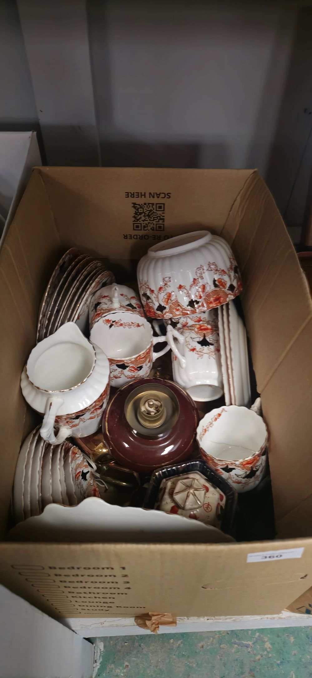 Lot 250: box containing part tea services plates cups etc