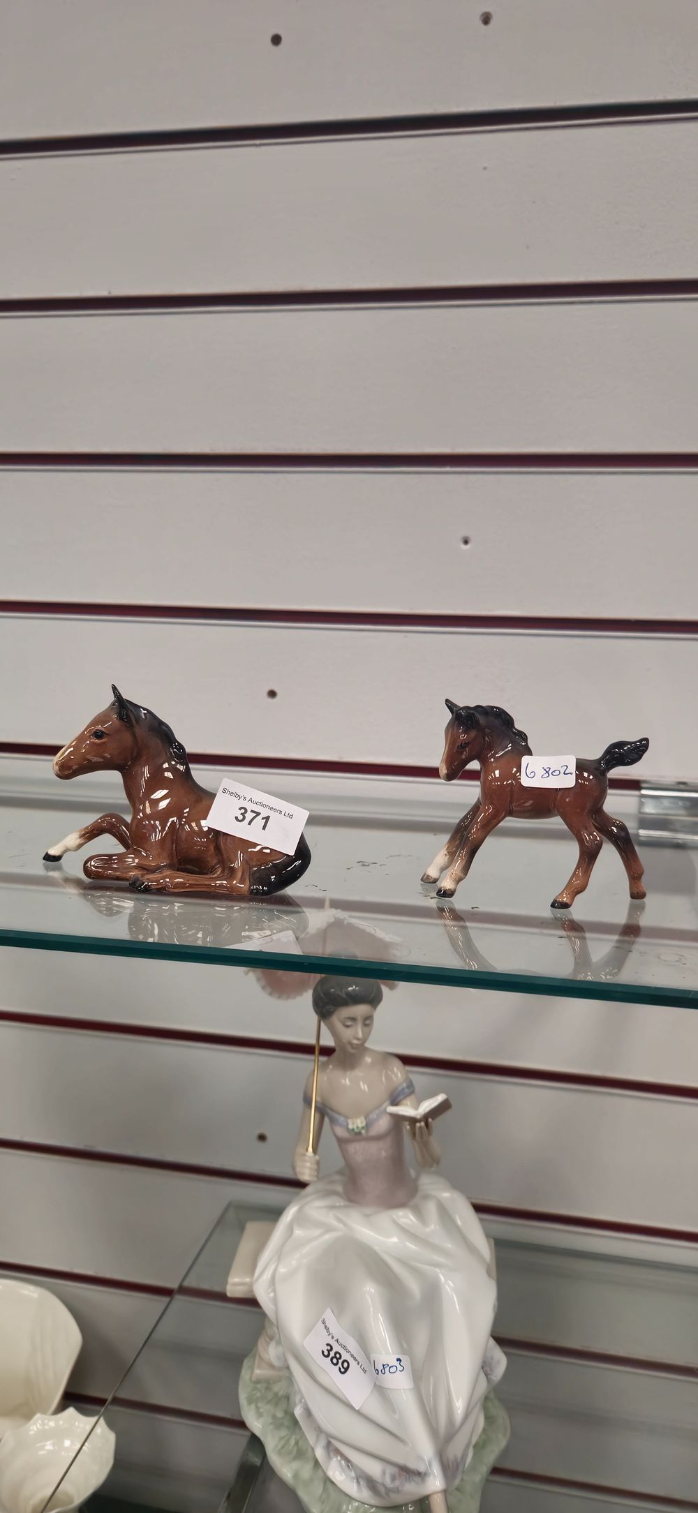 Lot 258: 2 x small beswick pottery foals