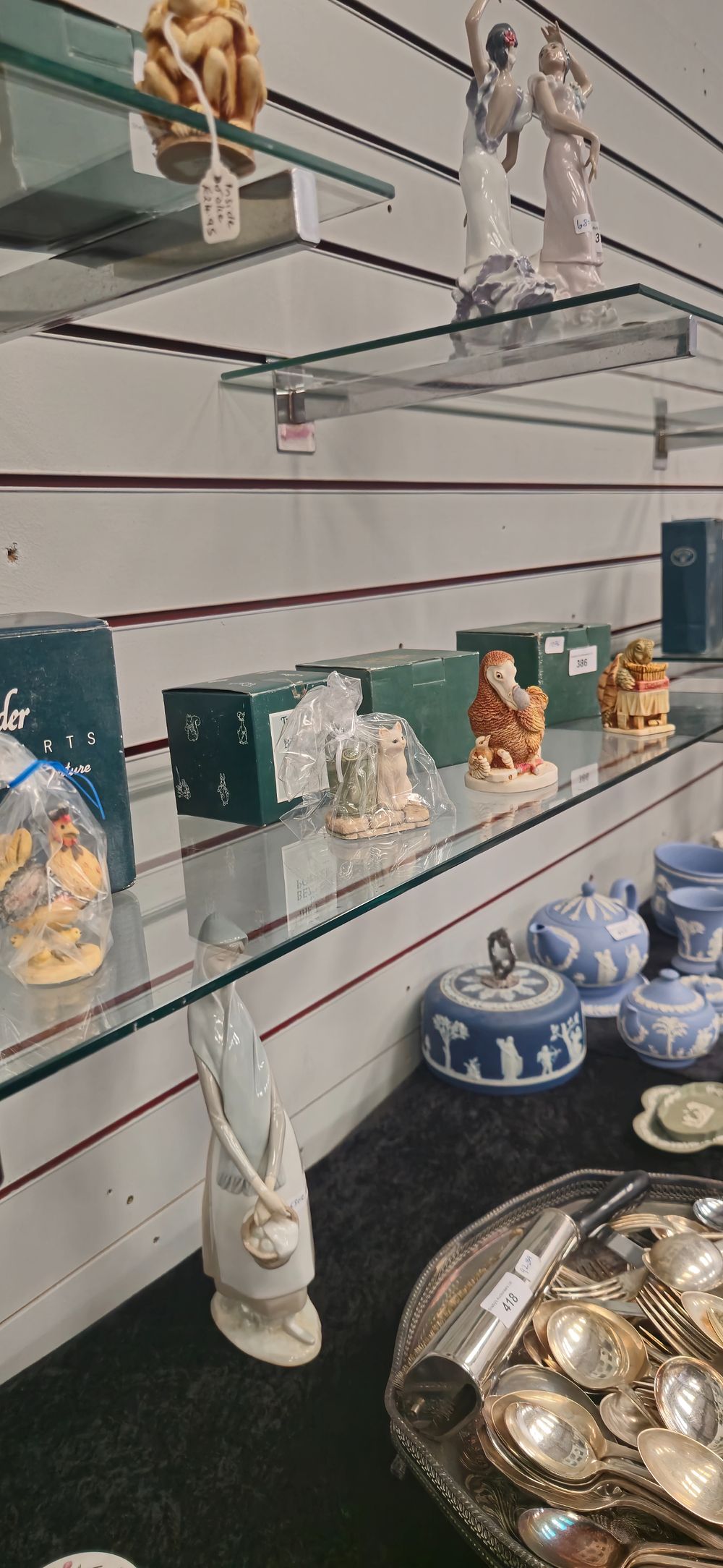 Lot 271: 2 x boarder fine arts figures cat with watering can and chicken with 2 x harmony pottery figures last laugh and wishful thinking