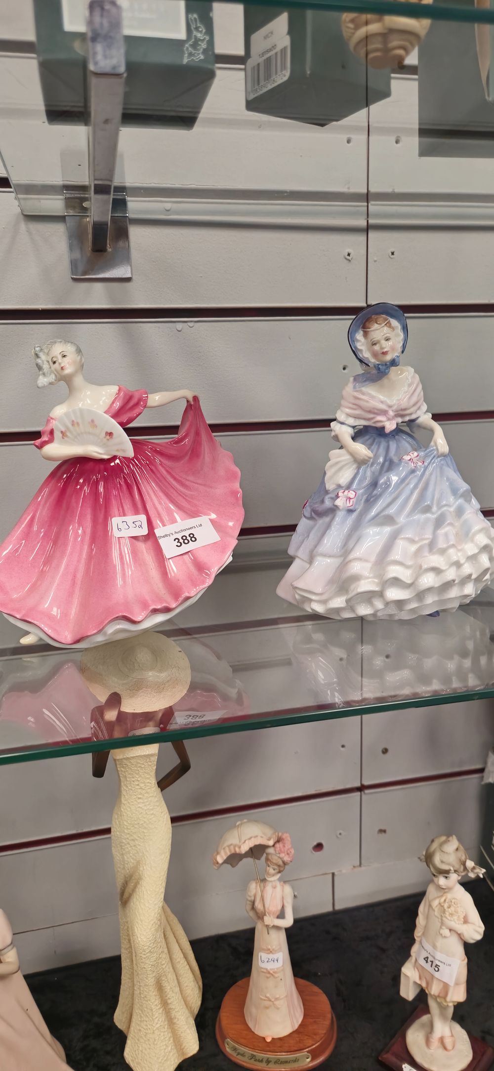 Lot 273: 2 x royal doulton lady figures alice and elaine