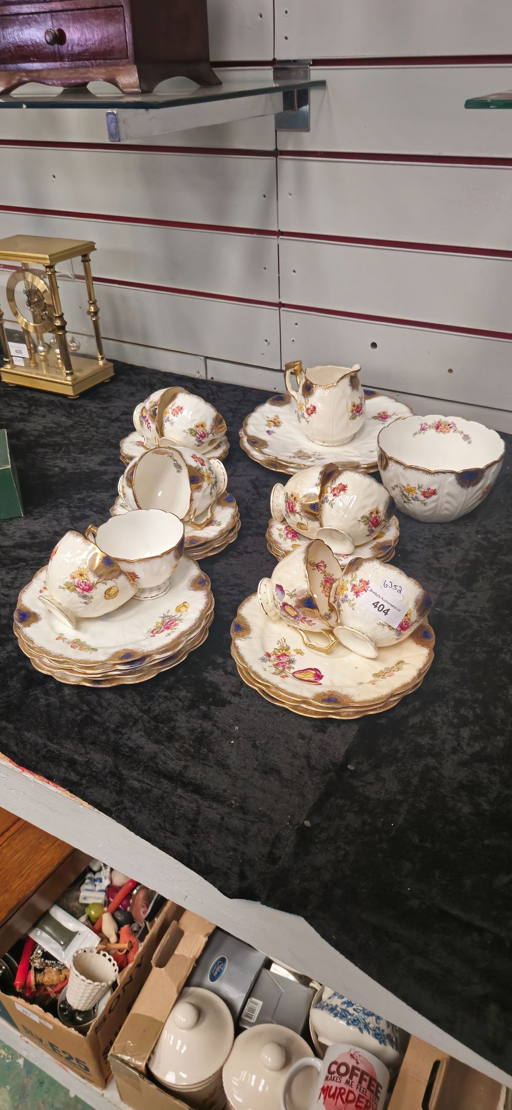 Lot 284: 32 pieces of victorian floral pattern porcelain tea set items