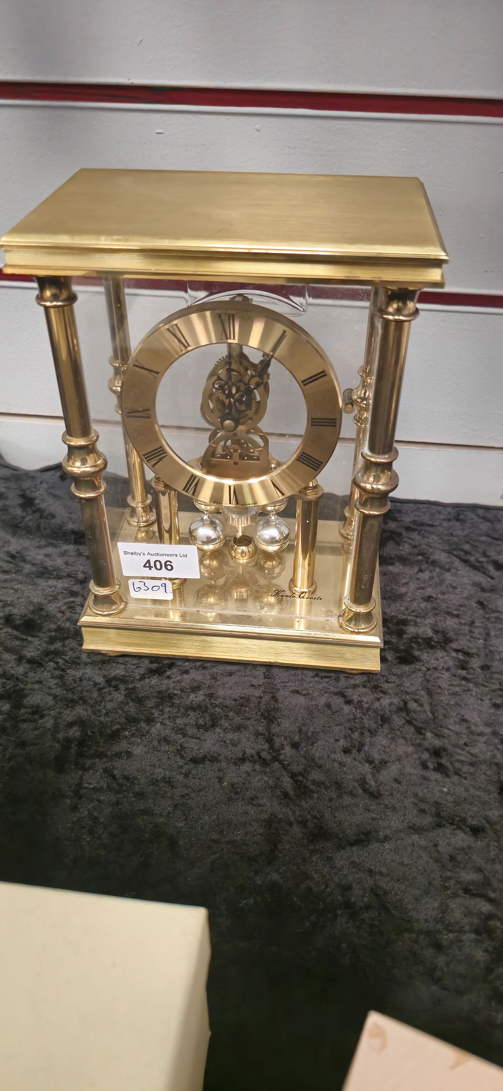 Lot 285: 1 x brass 1960s skeleton clock