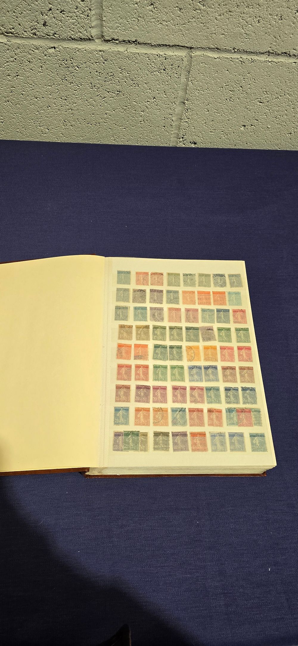 Lot 154: brown stamp albulm containg 32 pages of french and african stamps