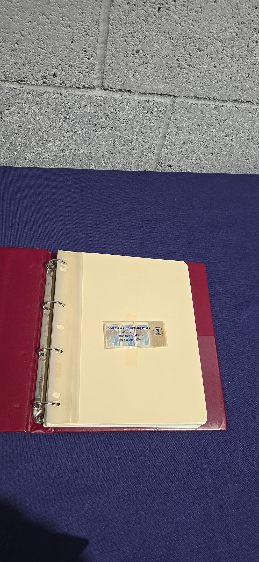 Lot 162: red stamp albulm containing 28 pages of usa postage stamps
