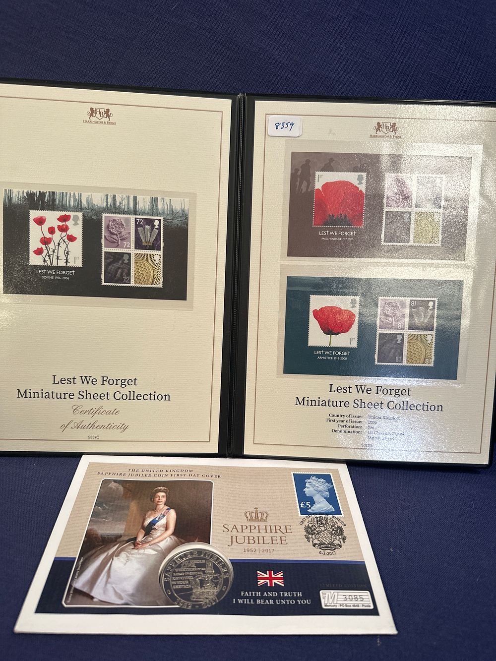 Lot 179: Lest we forget miniature sheet collection with sapphire jubilee coin first day covers