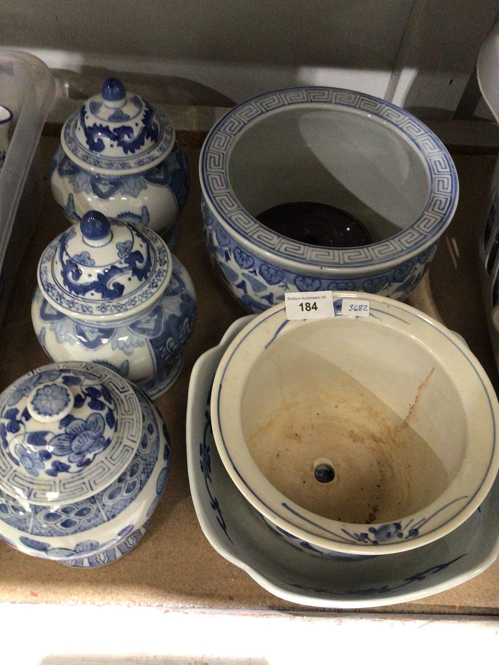 Lot 184: Selection of oriental style blue and white ware ginger hats planters etc