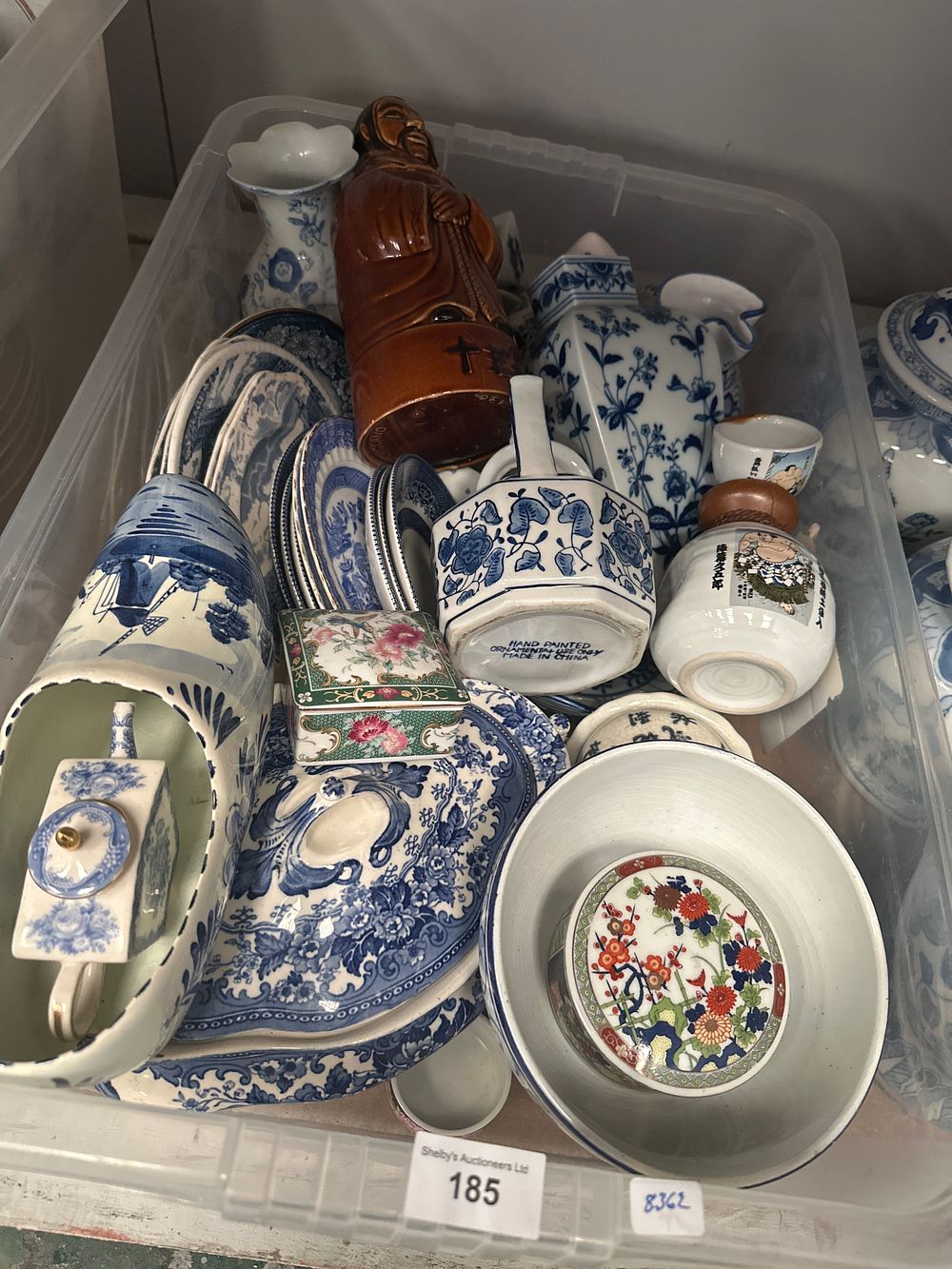 Lot 185: Box containing blue and white ware pottery items plates vases etc