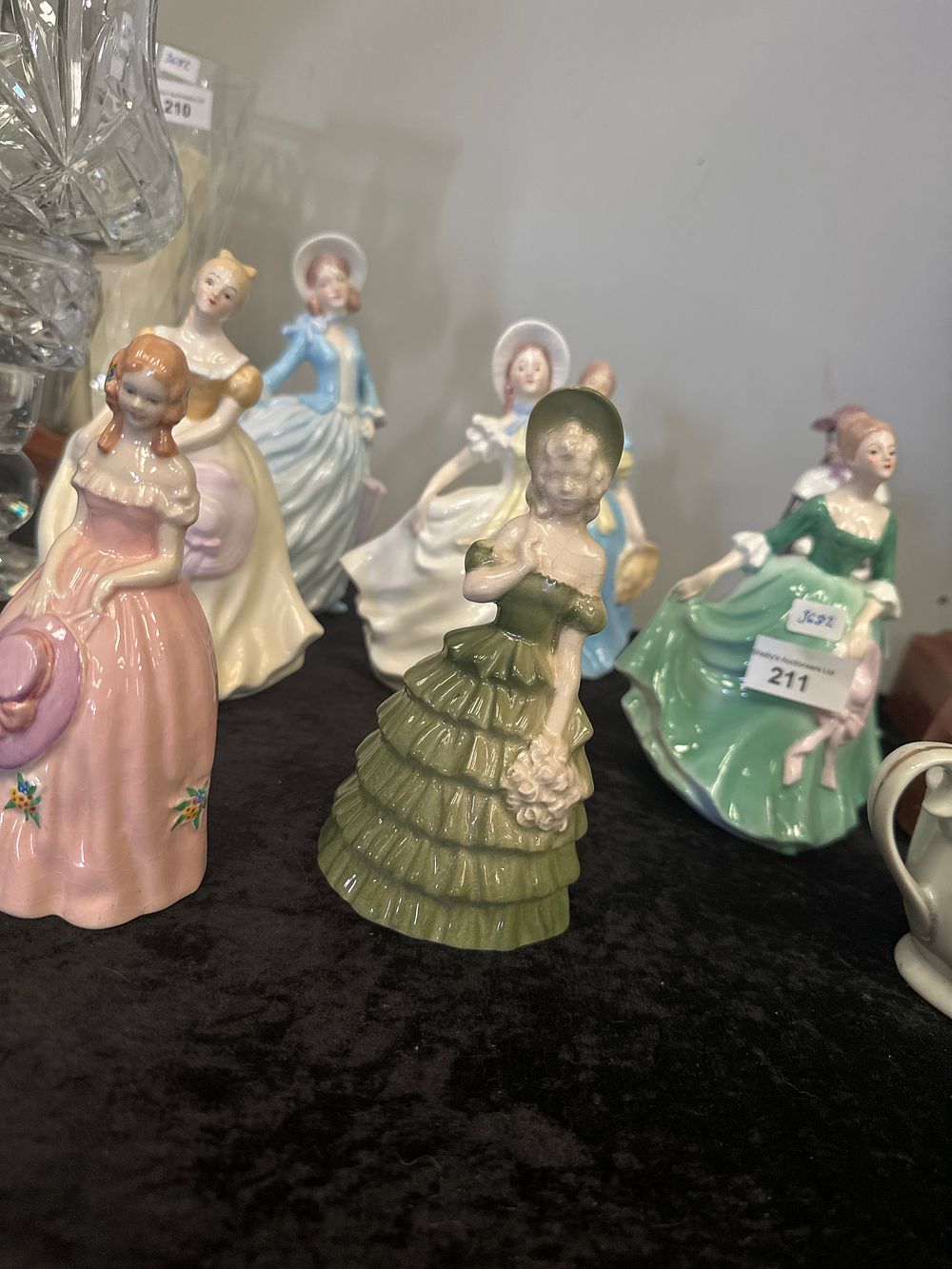 Lot 211: Selection of various porcelain lady figurines