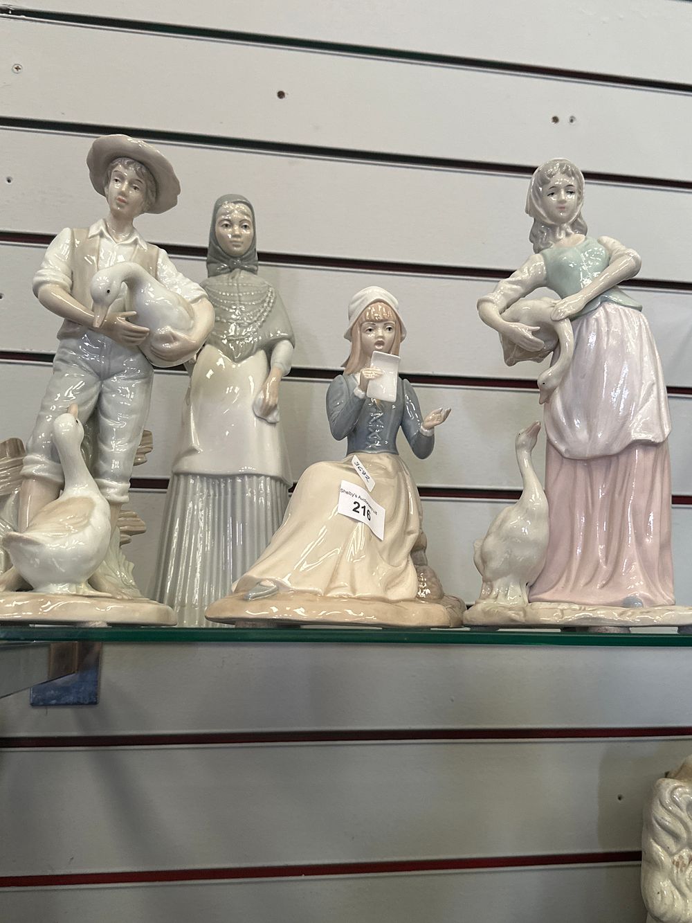 Lot 216: Selection of various large porcelain figurines