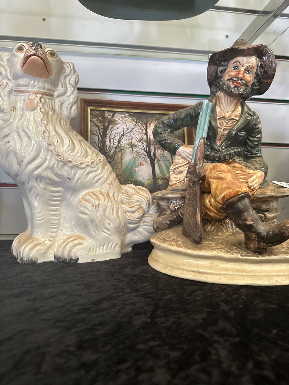 Lot 257: Capodimonte large figure with Staffordshire dog and print of children rescuing a deer
