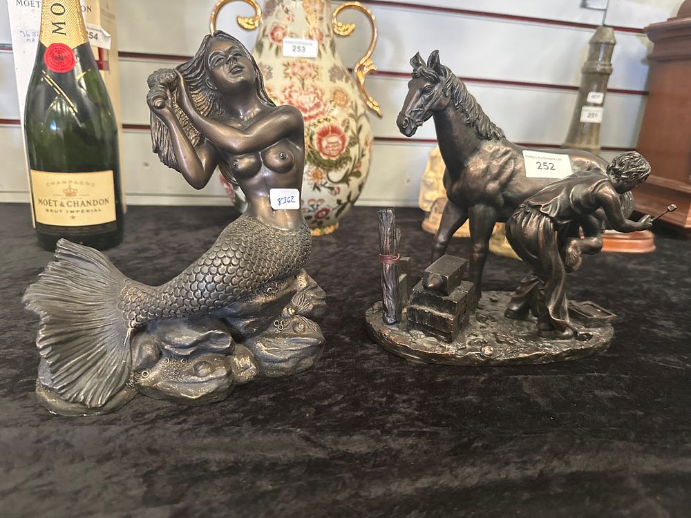 Lot 252: The leonardo collection mermaid figure with horse and farrier figure