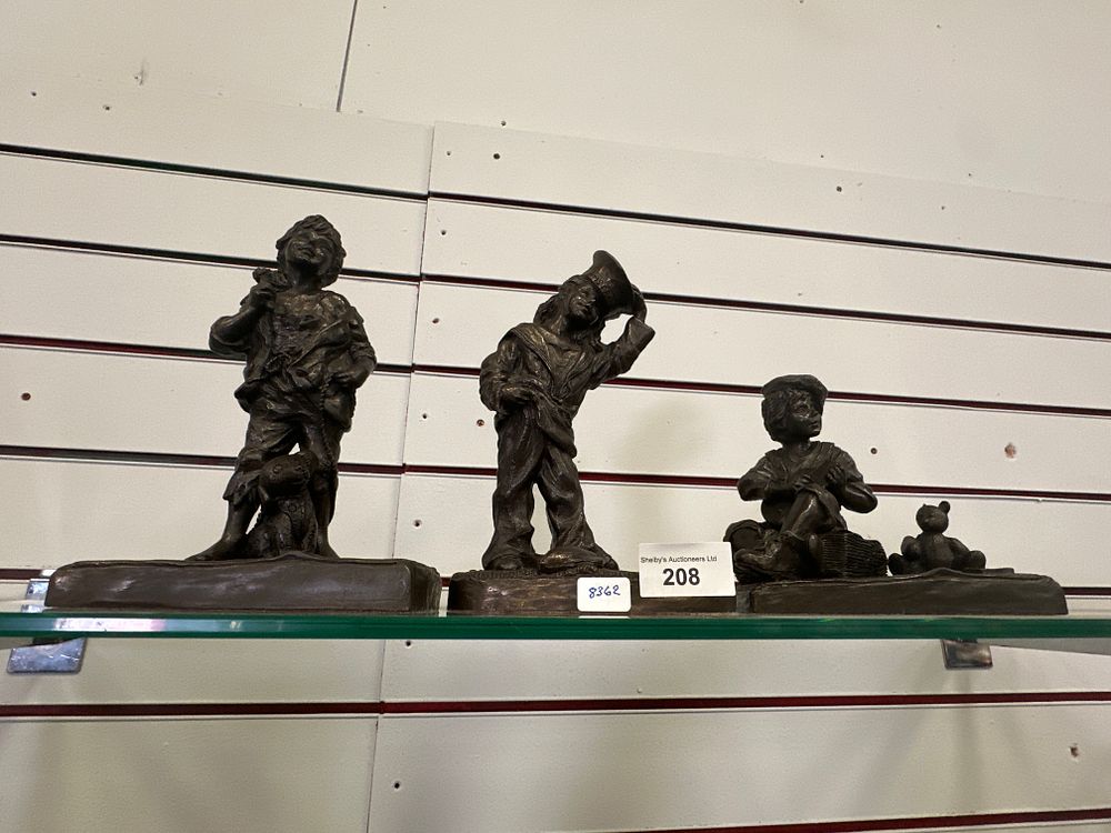 Lot 208: 3 various children playing resin figures