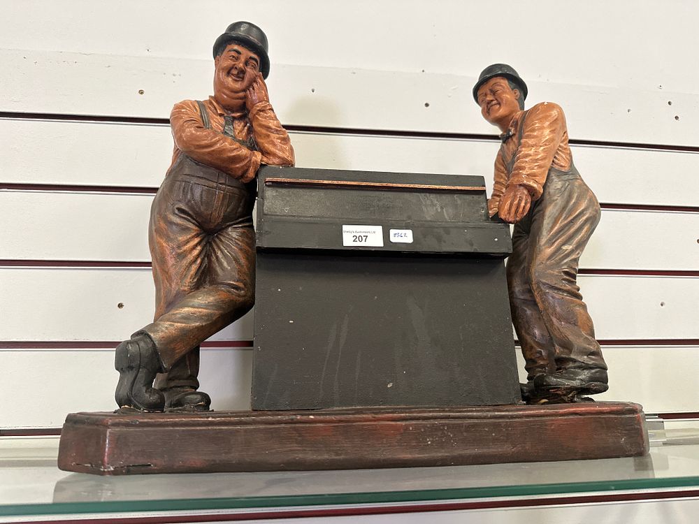 Lot 207: Large laurel and hardy plastic figurine