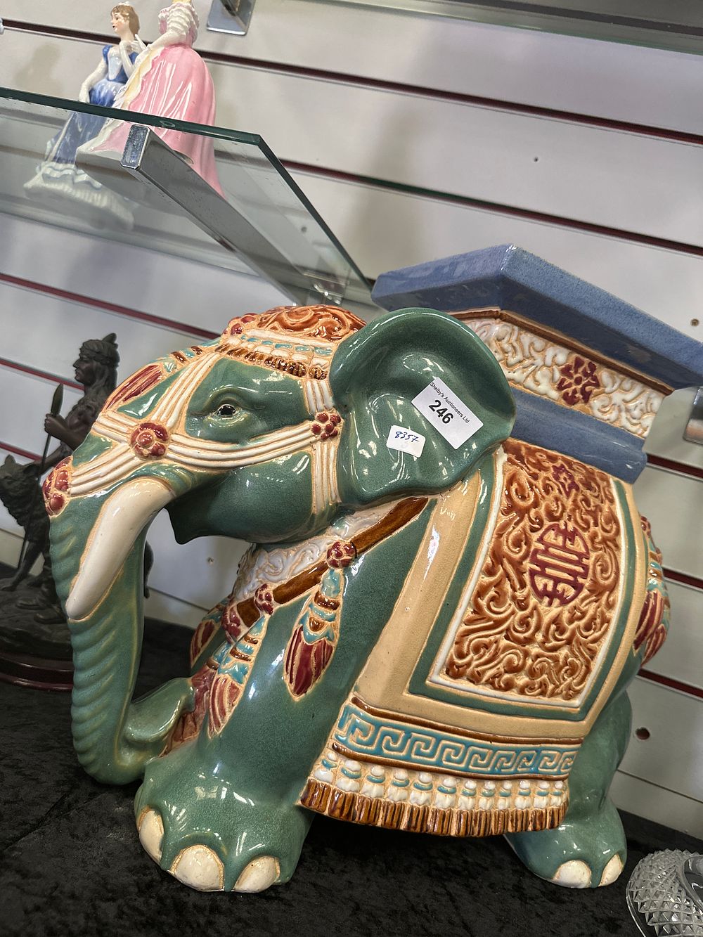 Lot 246: Large pottery elephant garden set