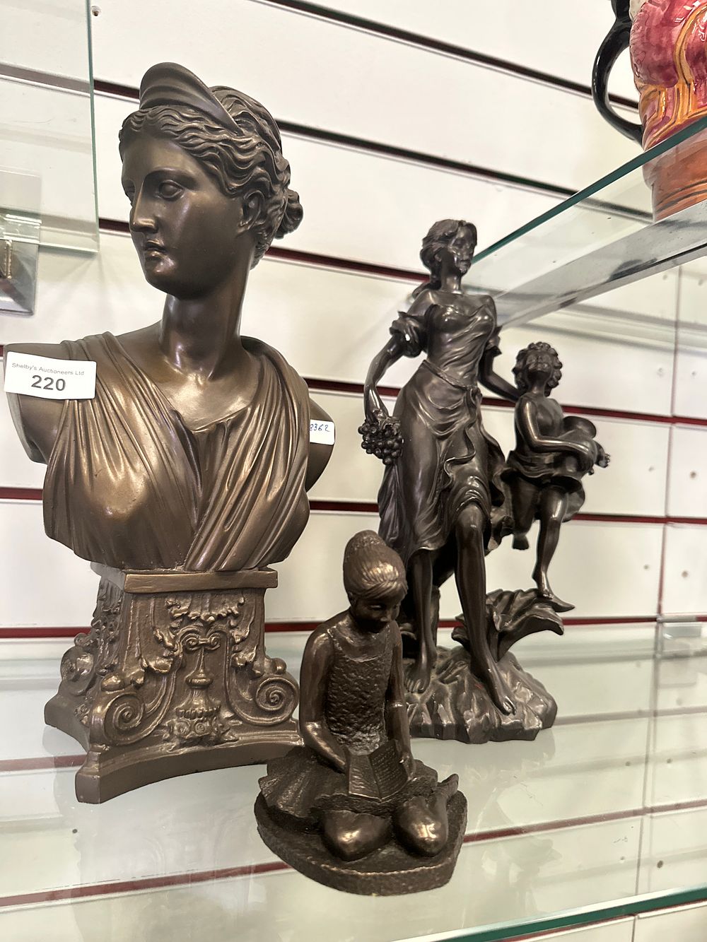 Lot 220: 3 x various size resin figurines mother and child is damaged