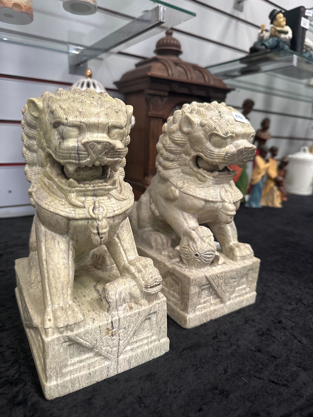Lot 239: Pair of soap stone oriental foo dogs