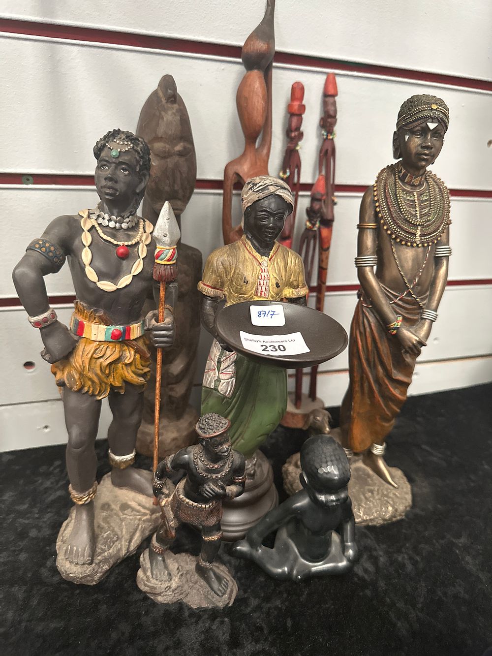 Lot 230: Selection of various African figures