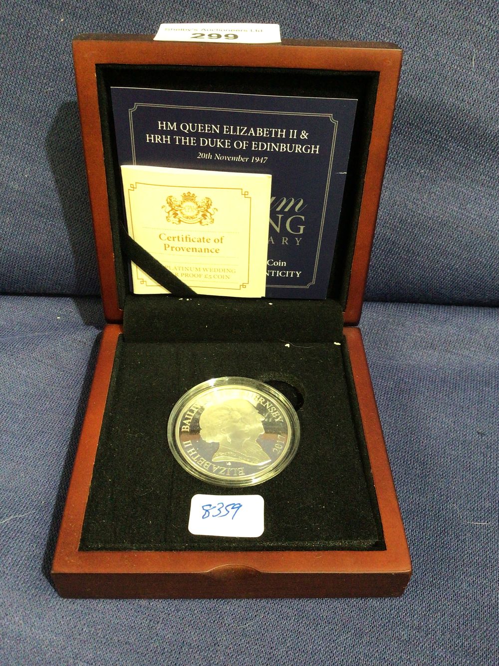 Lot 299: Hm Queen Elizabeth II and hrh the Duke of Edinburgh platinum wedding anniversary silver proof £5 coin