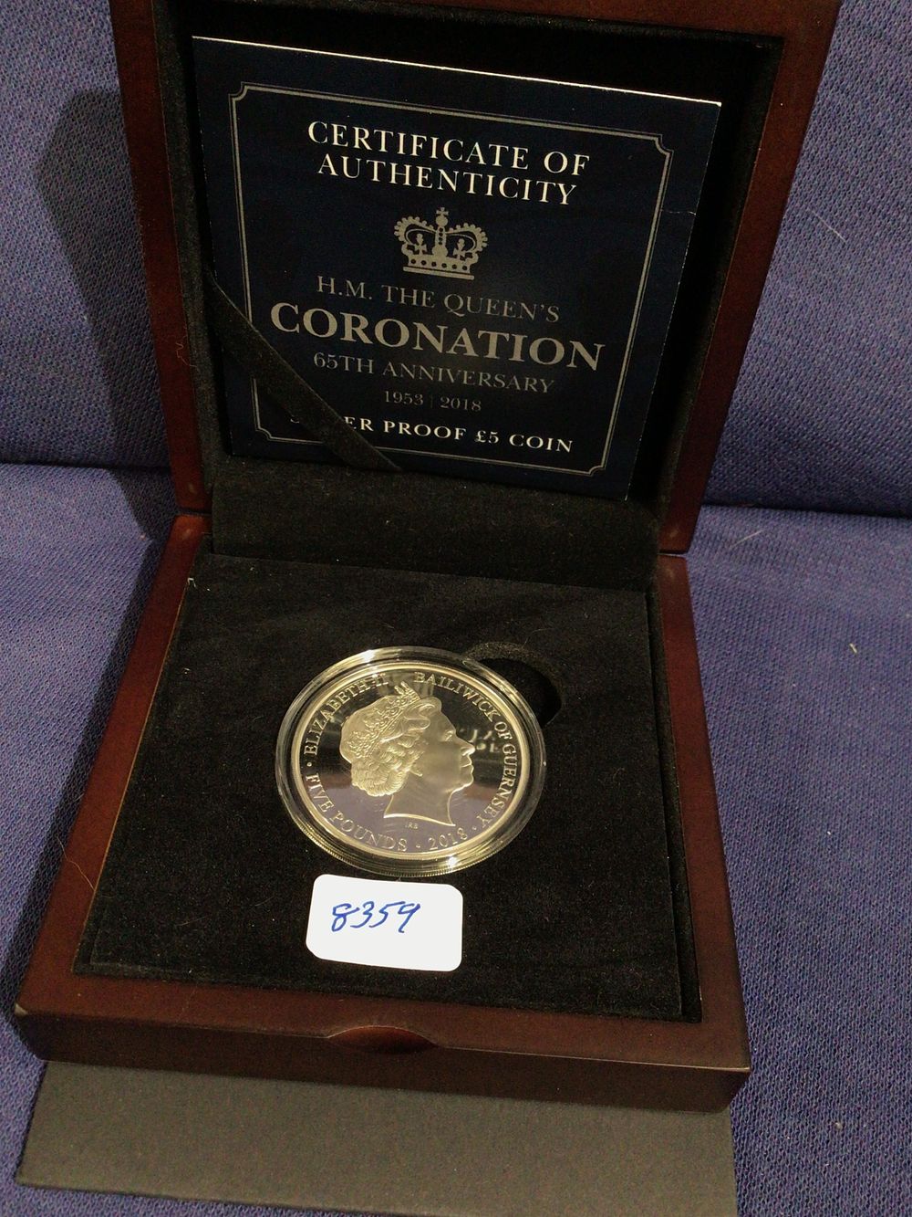 Lot 308: Hm the queens coronation 65th anniversary silver proof £5 coin complete in box