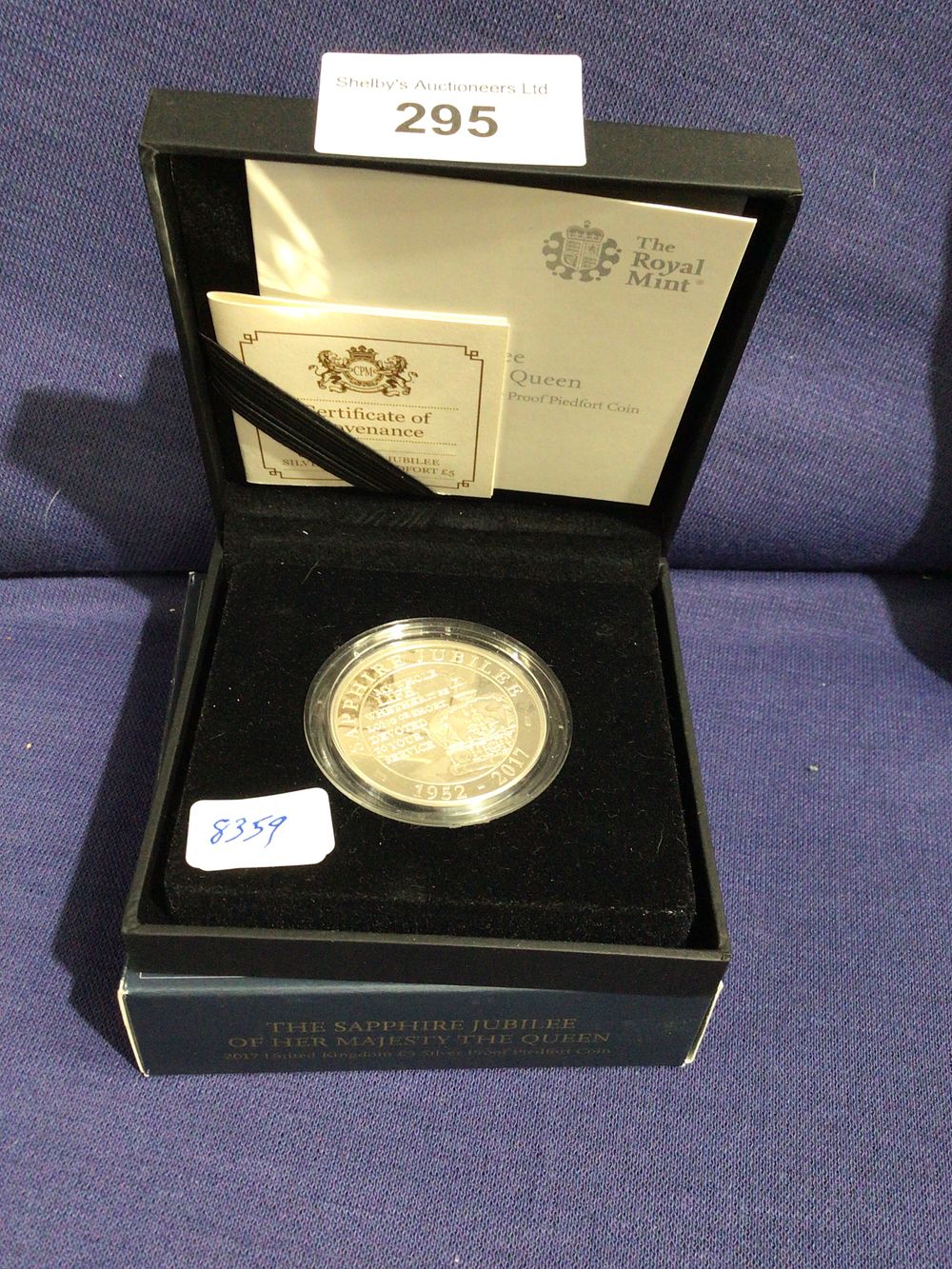 Lot 295: The royal mint the sapphire jubilee of her majesty the Queen 2017 United Kingdom £5 silver proof piedfort coin complete