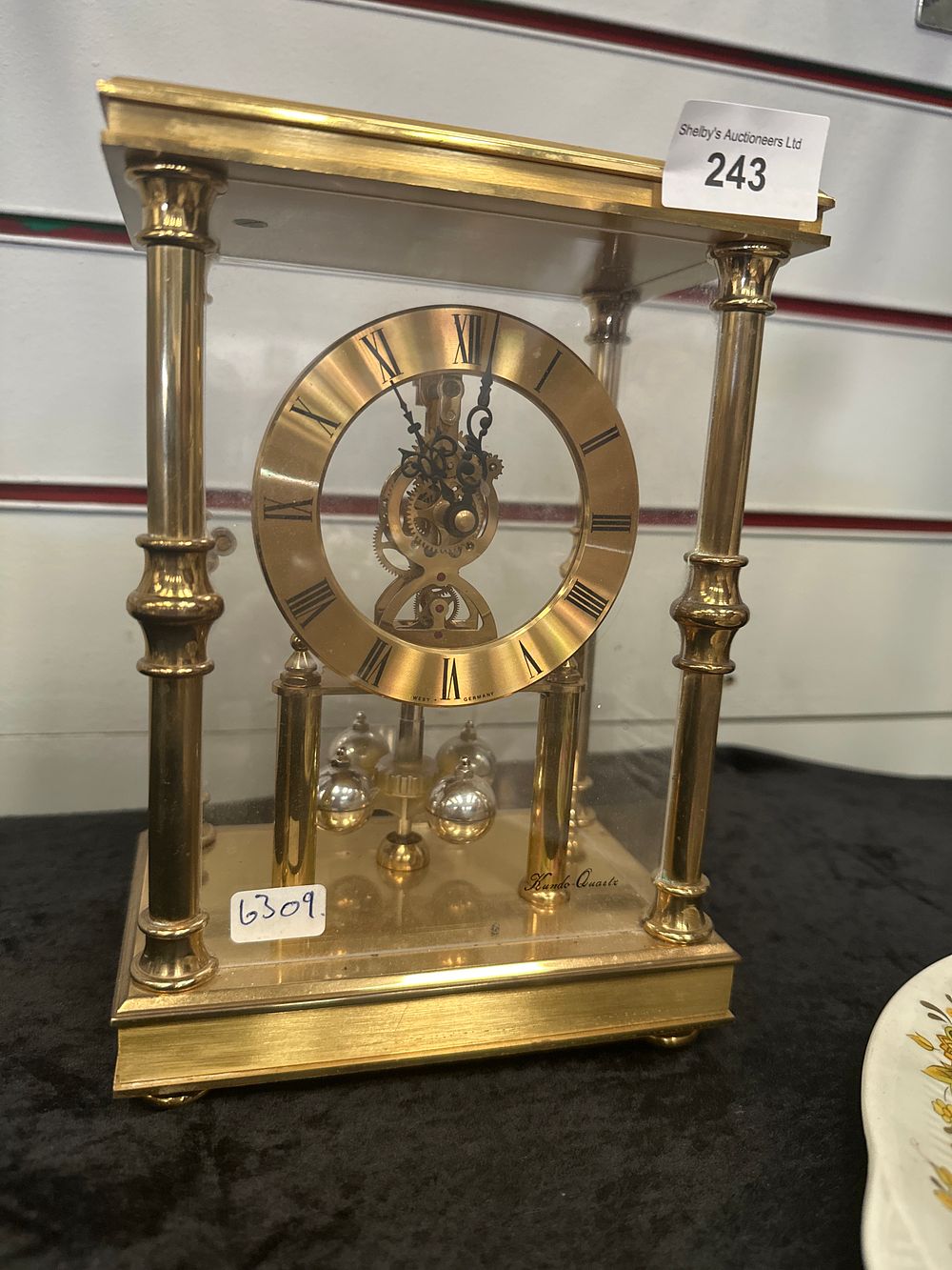 Lot 243: Kudo skeleton heavy brass mantle clock quartz movement