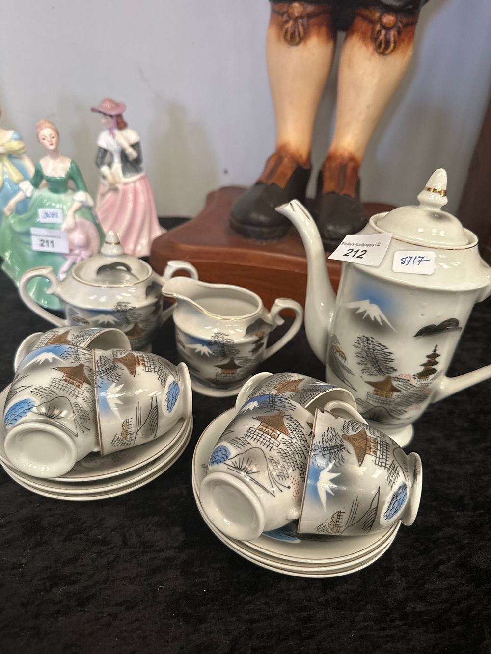 Lot 212: Selection if oriental geisha girl tea set items