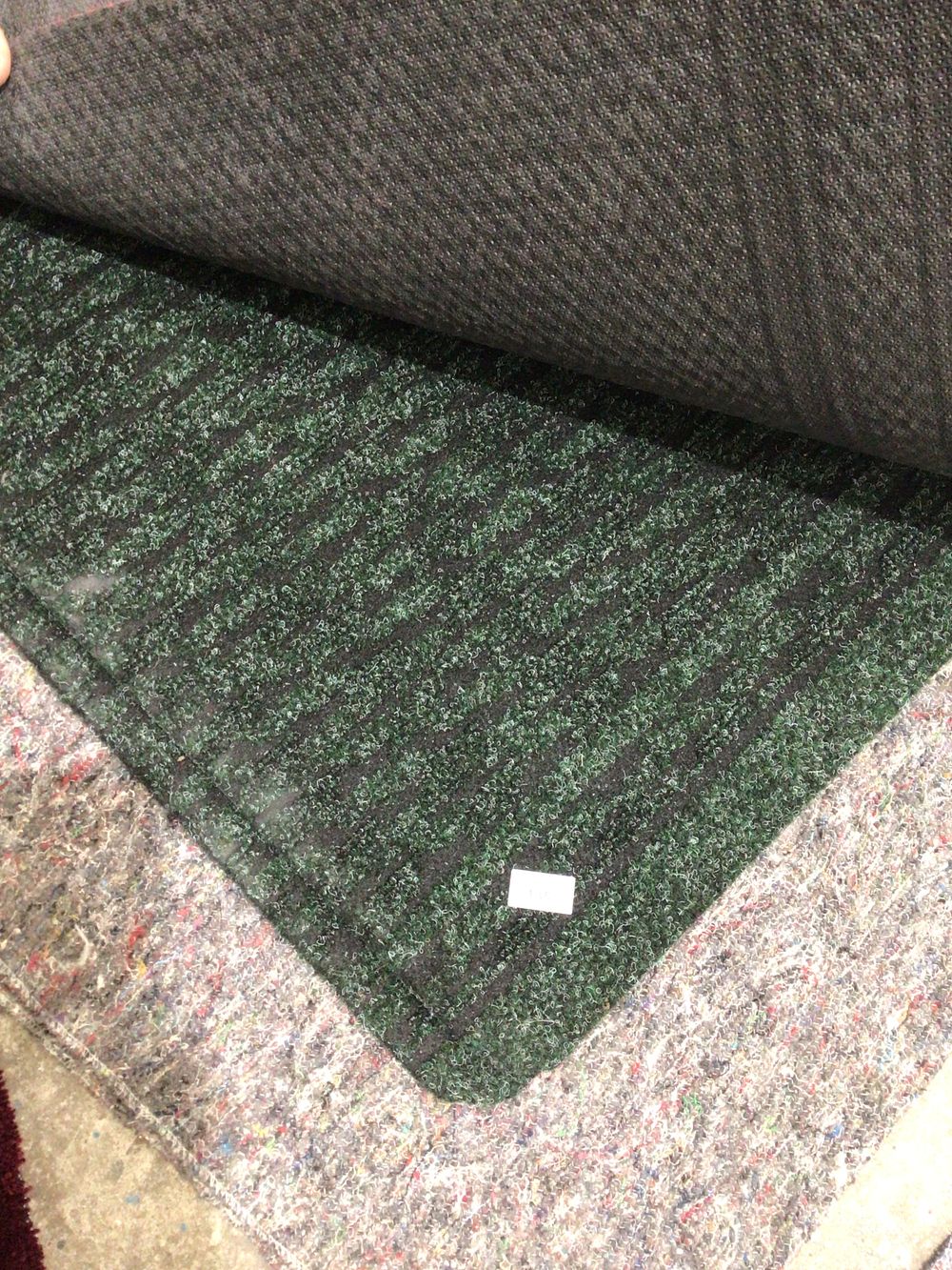 Lot 135: Heavy duty rubber backed new hall way floor...