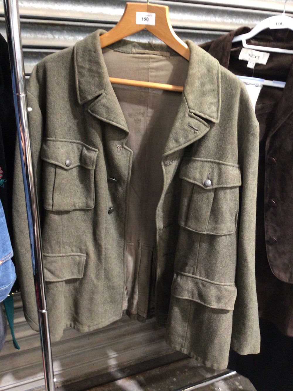 Lot 180: Navy uniform jacket very large size