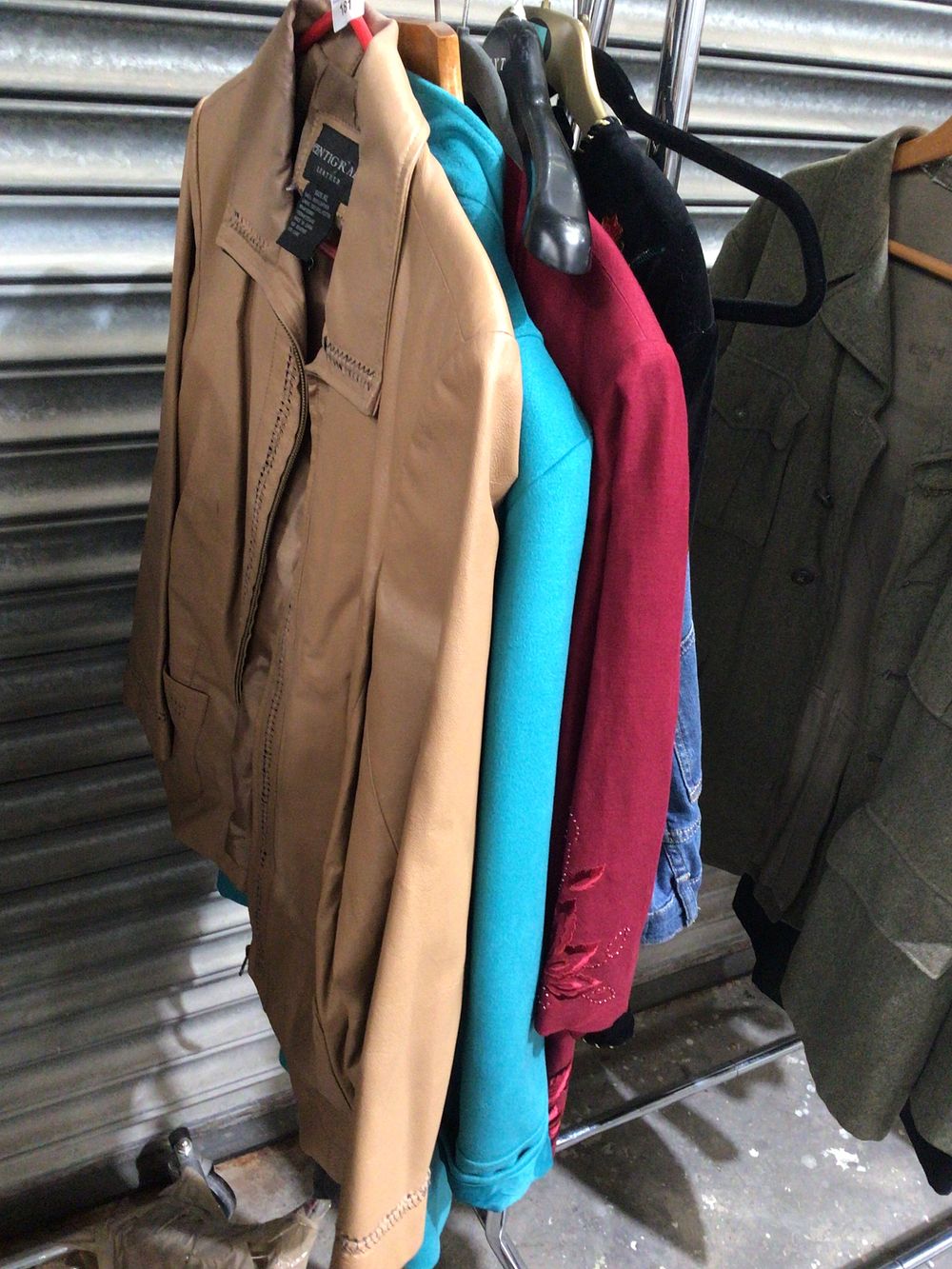Lot 181: Selection of various size ladies clothing items coats...