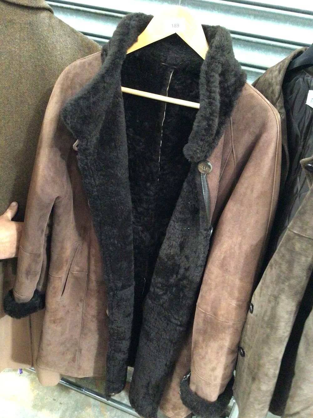 Lot 189: Higgs leather sheepskin coat fully lined size 14