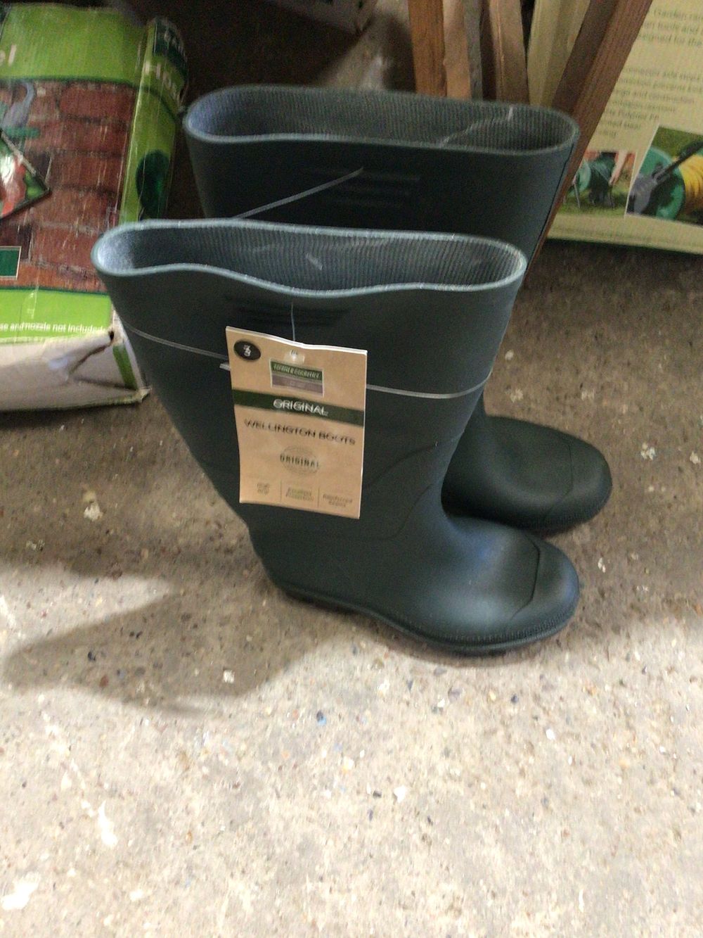 Lot 209: Pair of town and country new wellington boots...