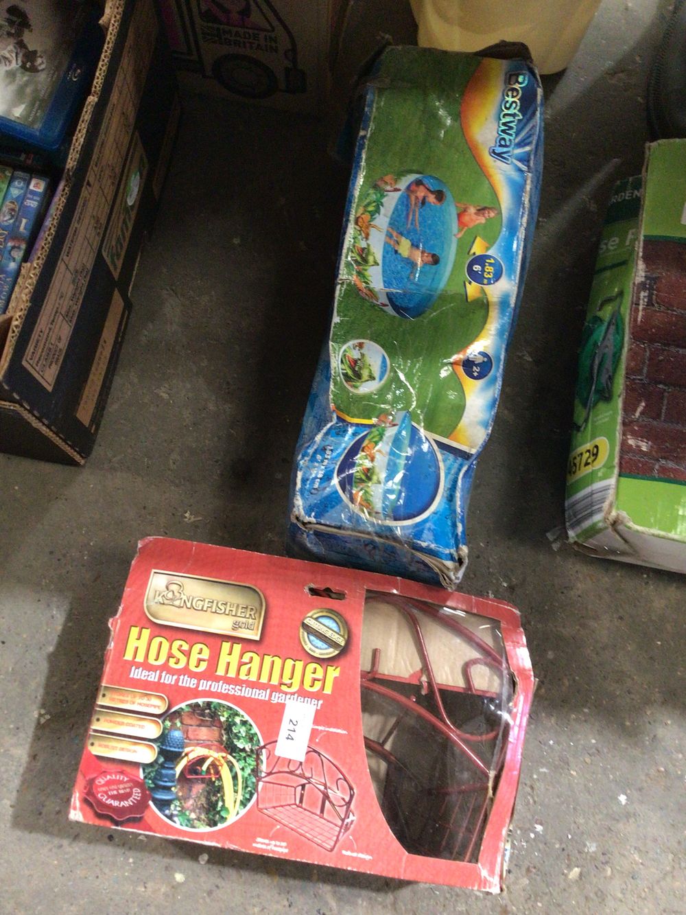 Lot 214: Kingfisher boxed hose hanger with child’s paddling pool