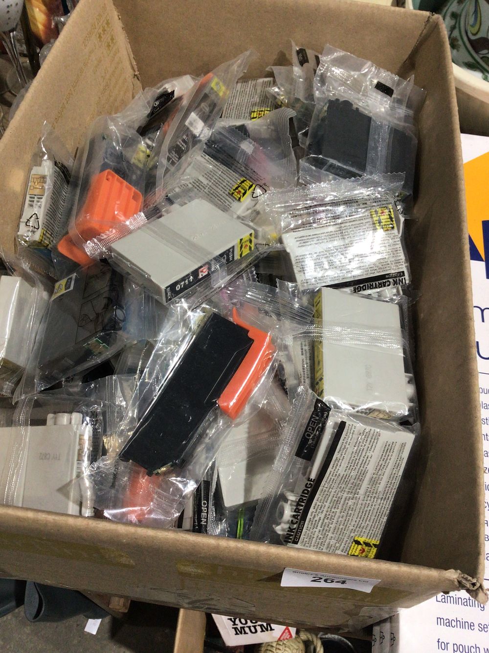 Lot 264: Box containing approximately 100 various new in package...