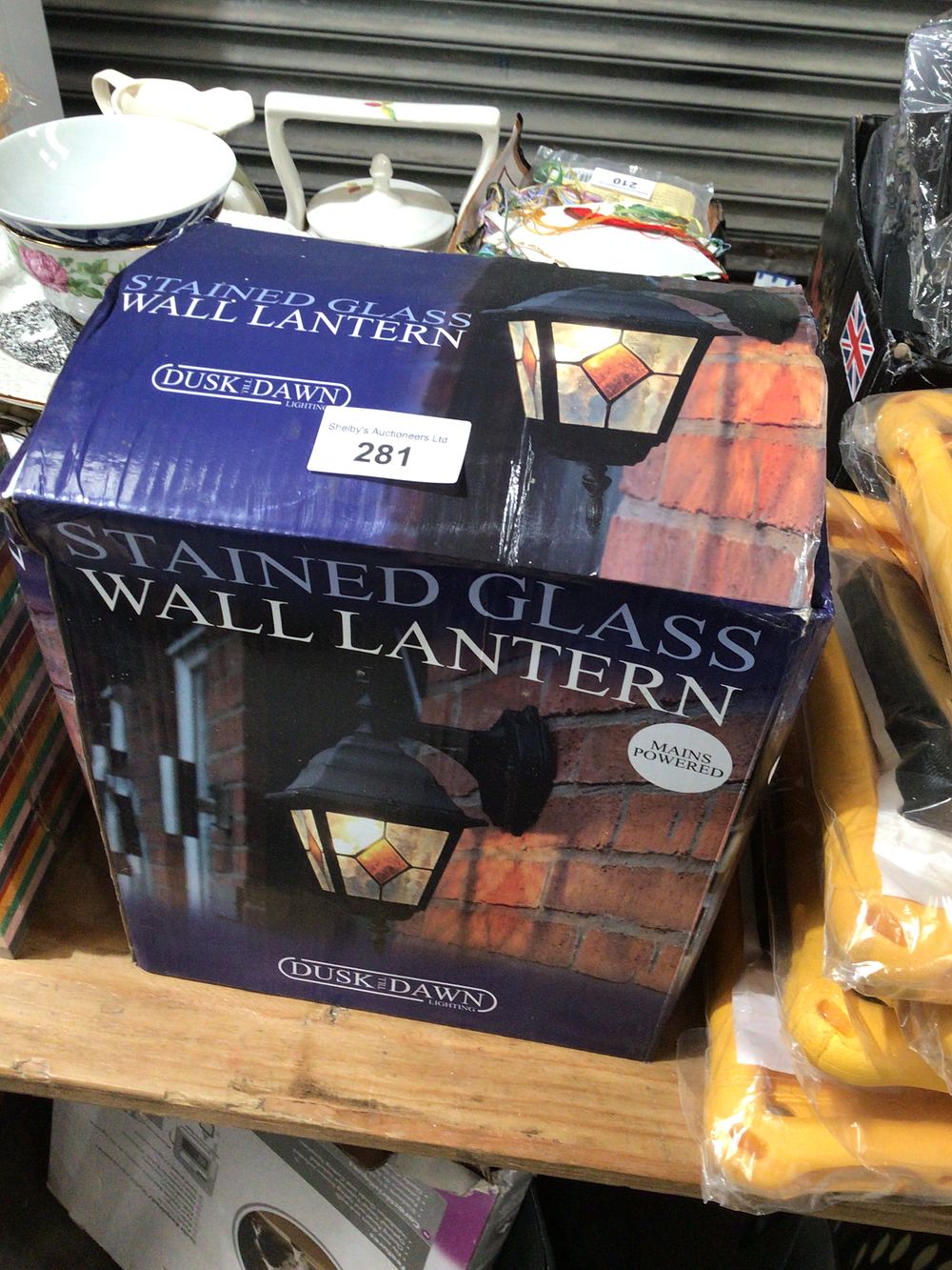 Lot 281: Dusk till dawn stained glass wall lantern new...