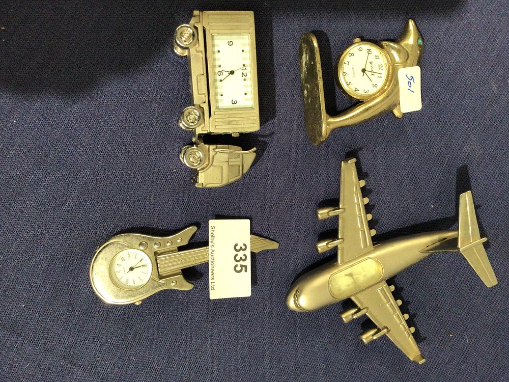 Lot 335: Selection of various novelty small clocks