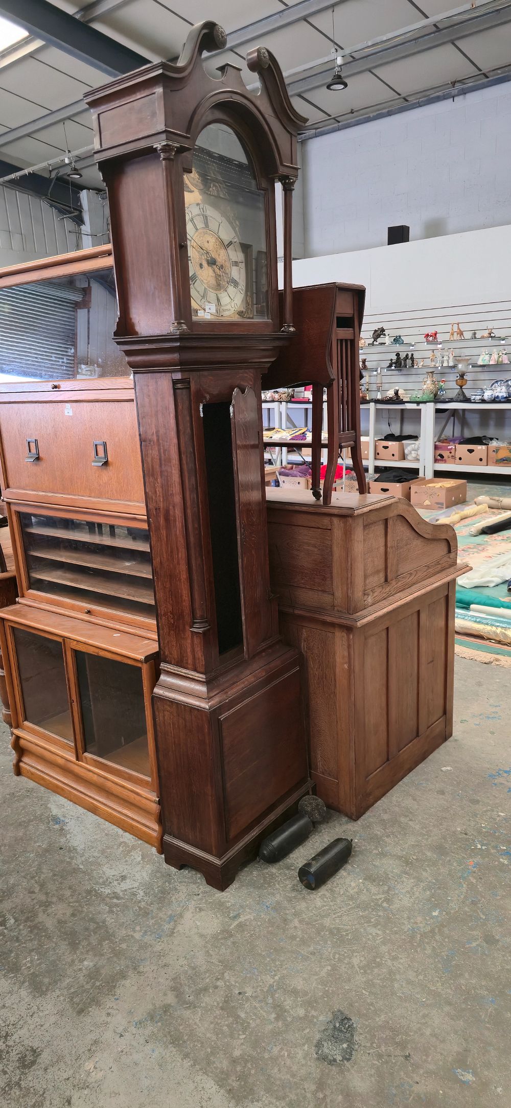 Lot 63: Oak long case grand father clock Hargreaves’s settle...