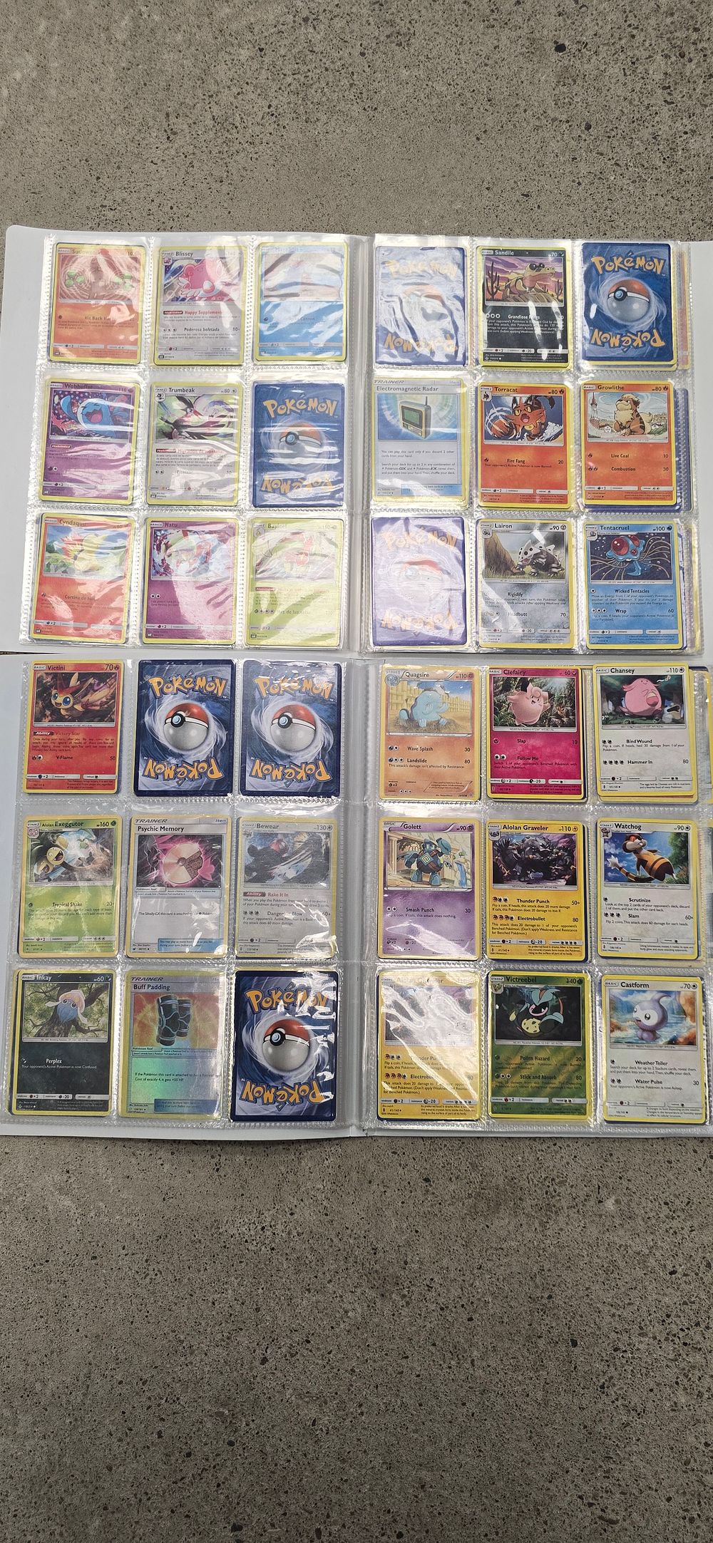 Lot 160: Two folders containing approximately 200. Various Pokémon cards.