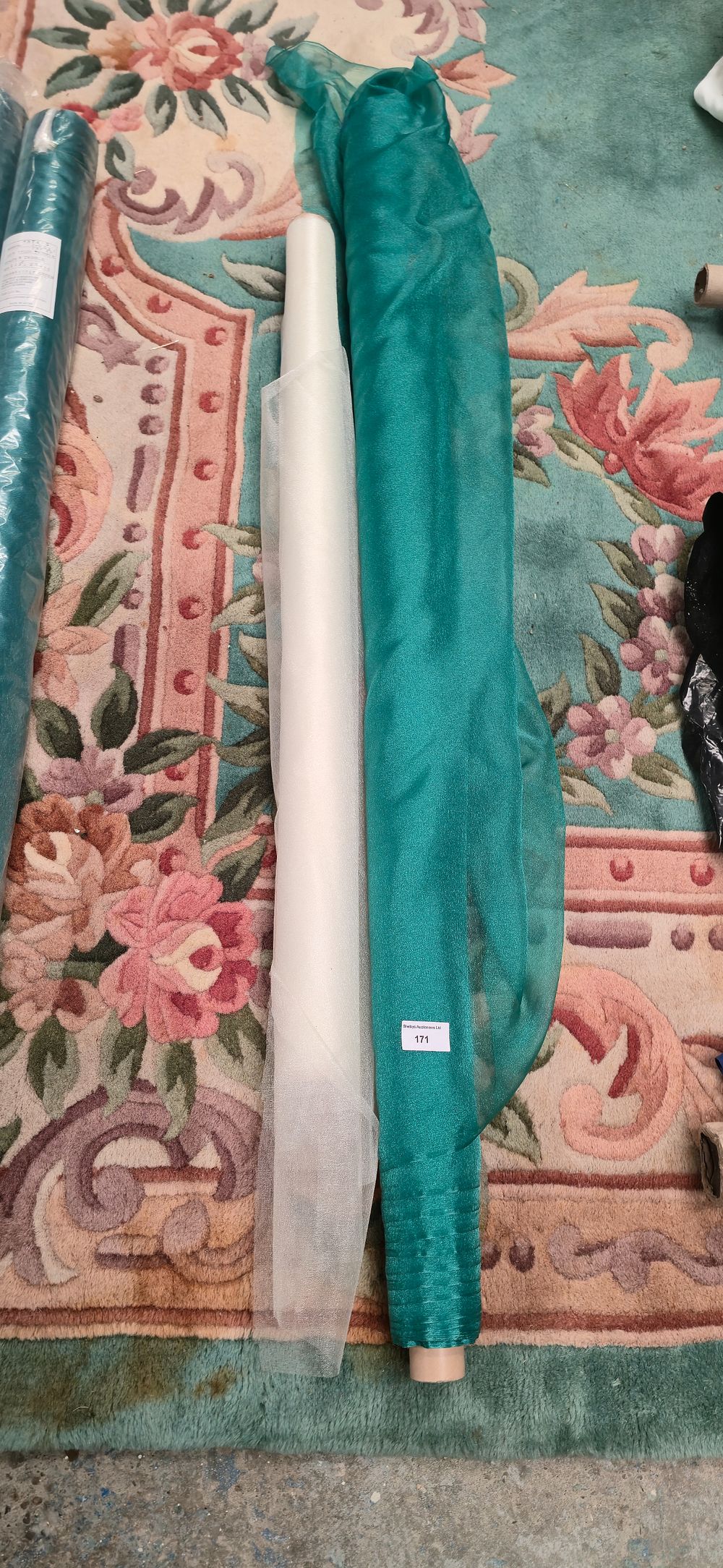 Lot 171: One roll of green nylon material, with sheer...