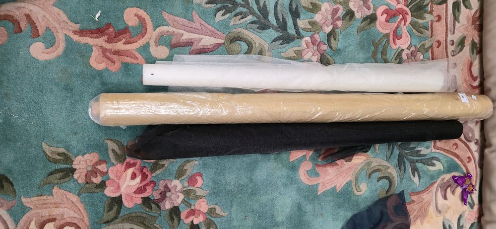 Lot 182: Four rolls of organza shirt, material, black navy...