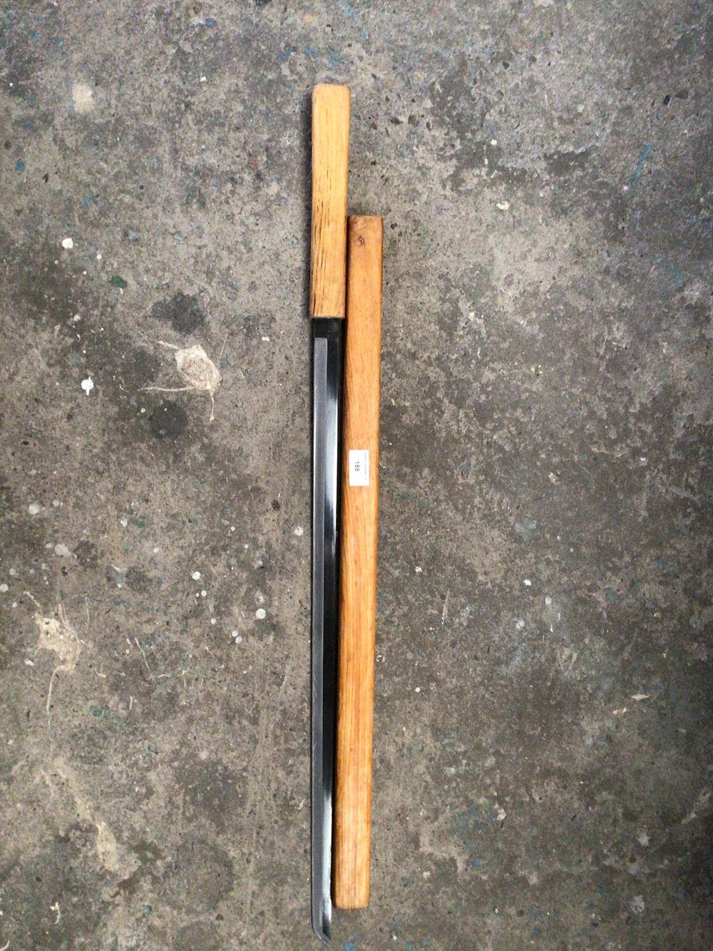 Lot 188: Wooden sword sheath with ornamental integrated sword