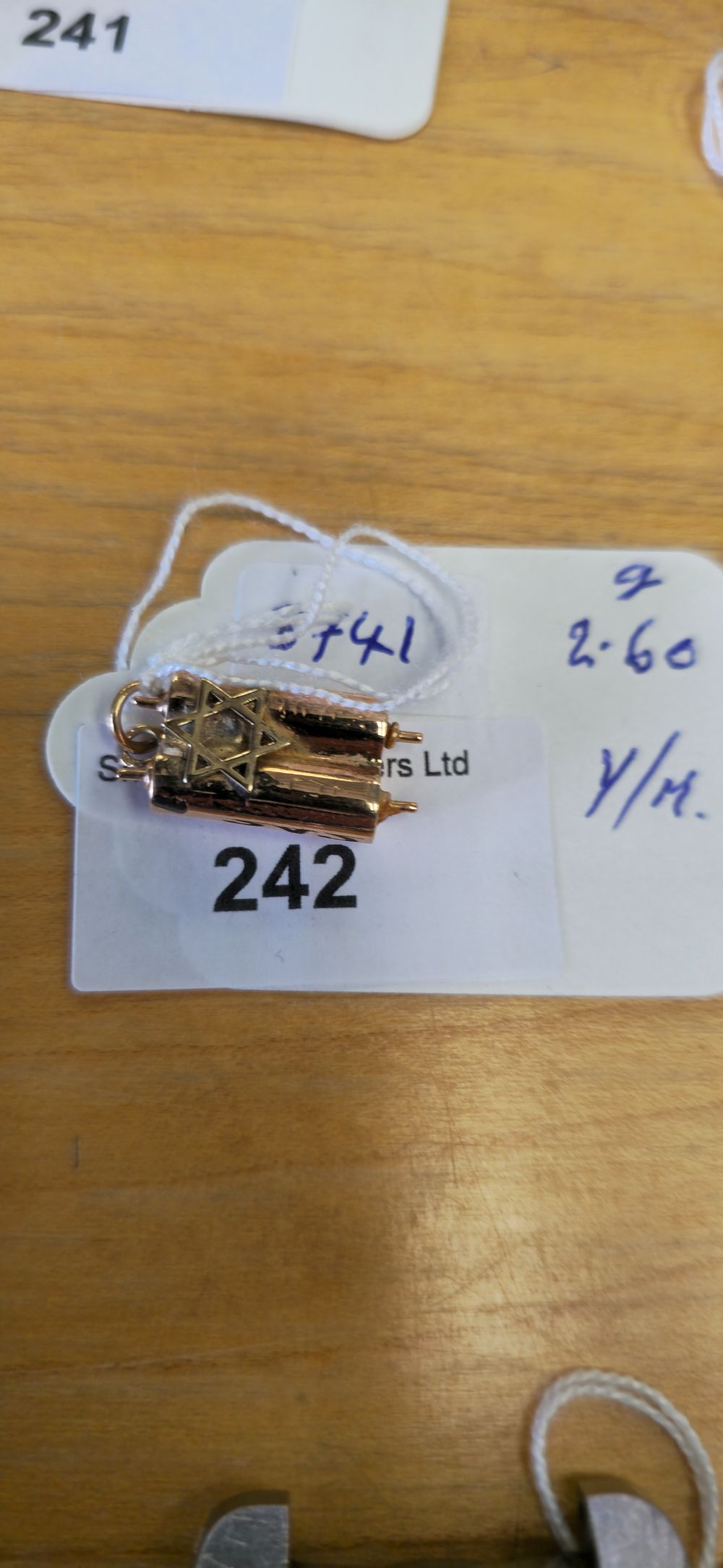 Lot 242: 14 carat gold, Jewish Torah, scroll book pendant...