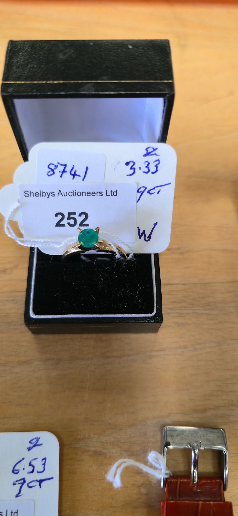 Lot 252: 9 carat gold, Emerald, inset ladies solitaire ring...