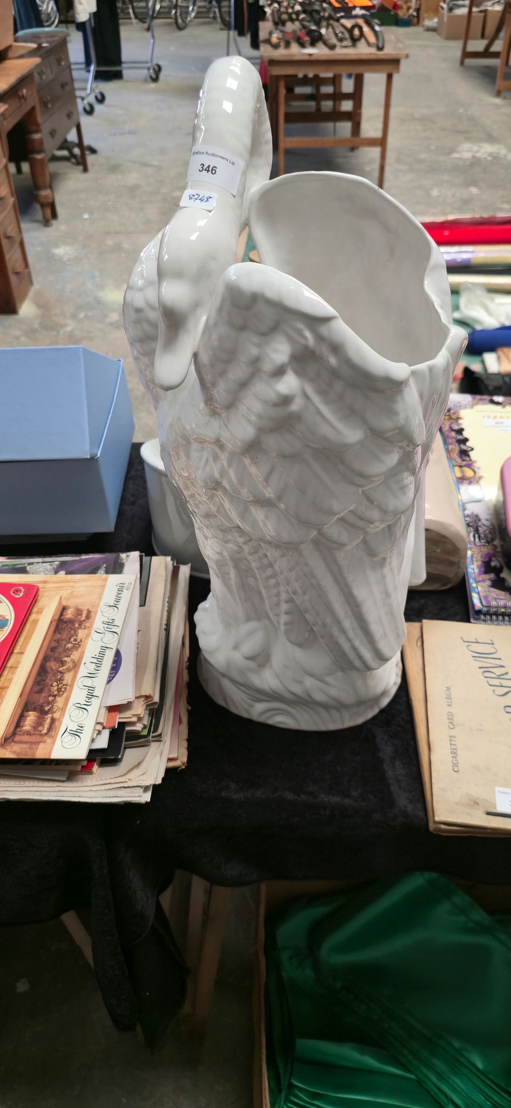 Lot 346: Large white swan, pottery umbrella stand